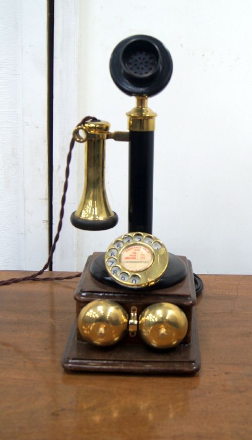 a good original english candlestick phone