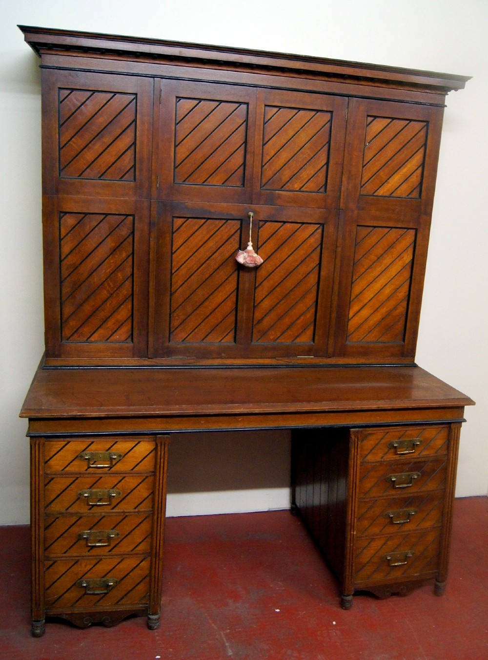 a good oak estate desk made by sopwith of newcastle in the arts and crafts style