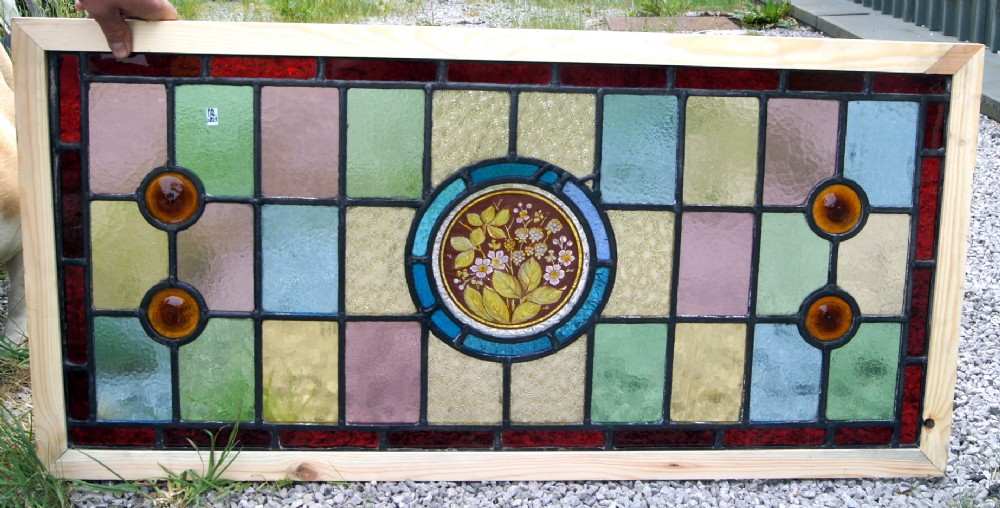 a good late victorian painted lead window depicting flowers