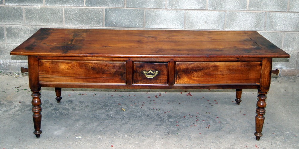 a stunning antique cherry wood coffee table