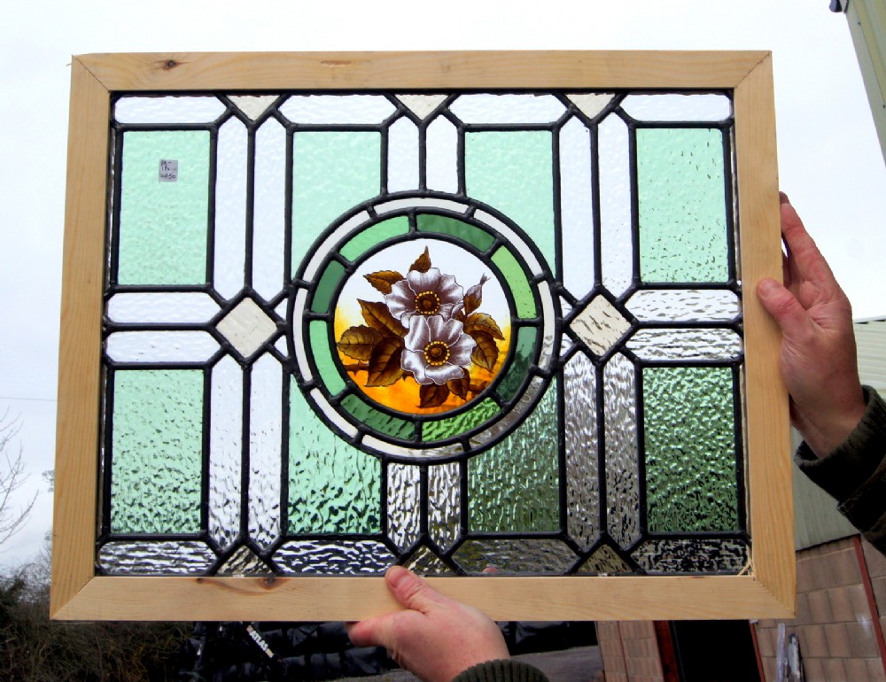 a wonderful stained glass painted flower window