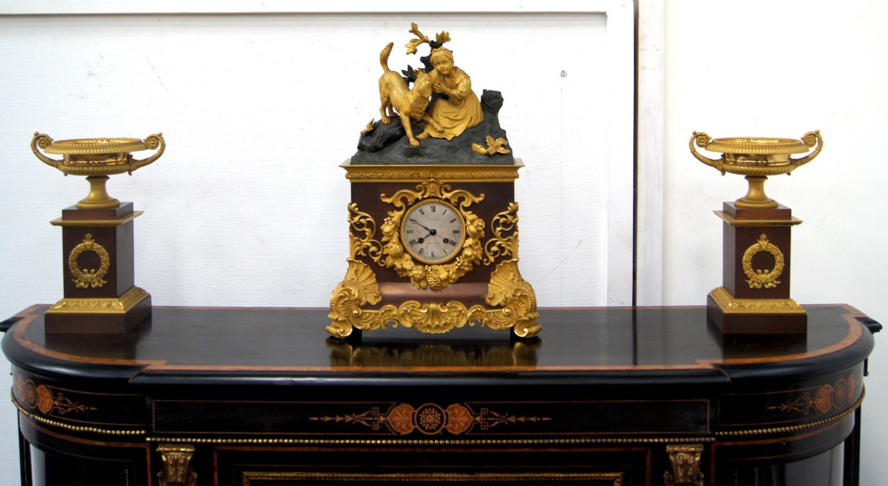 a gilt bronze and brown patinated 3 piece 19th century french clock set