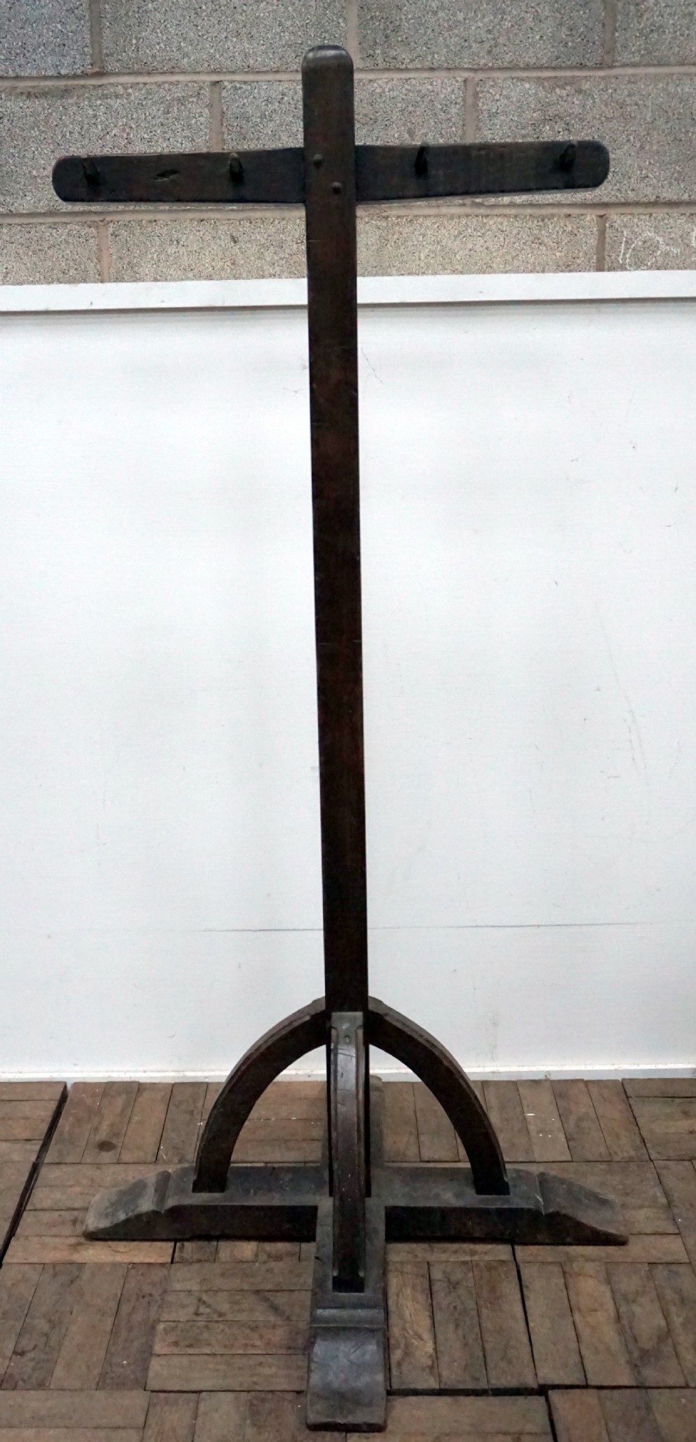 a very unusual arts and crafts solid oak double sided coat stand