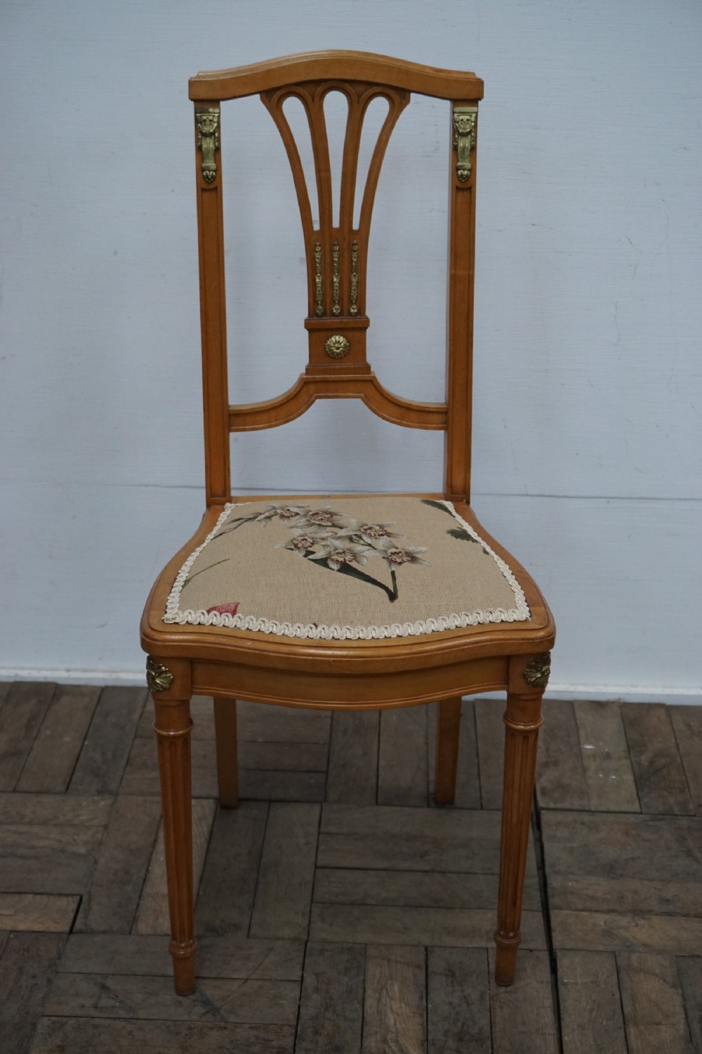 an elegant french satinwood sidebedroom chair