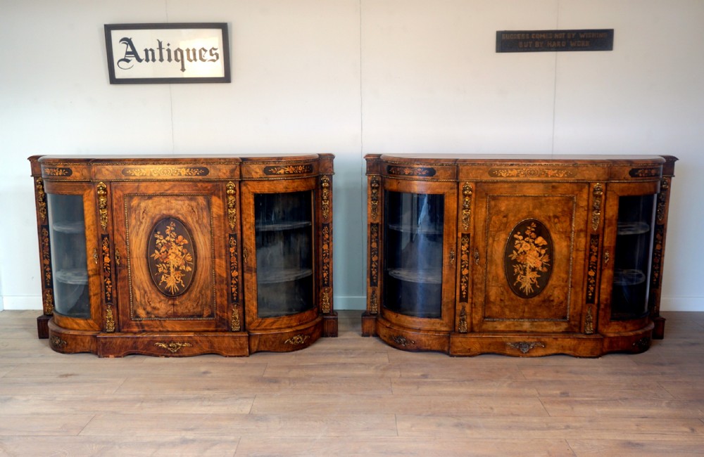 an outstanding matching pair of victorian burr walnut ormolu and marquetry credenzas