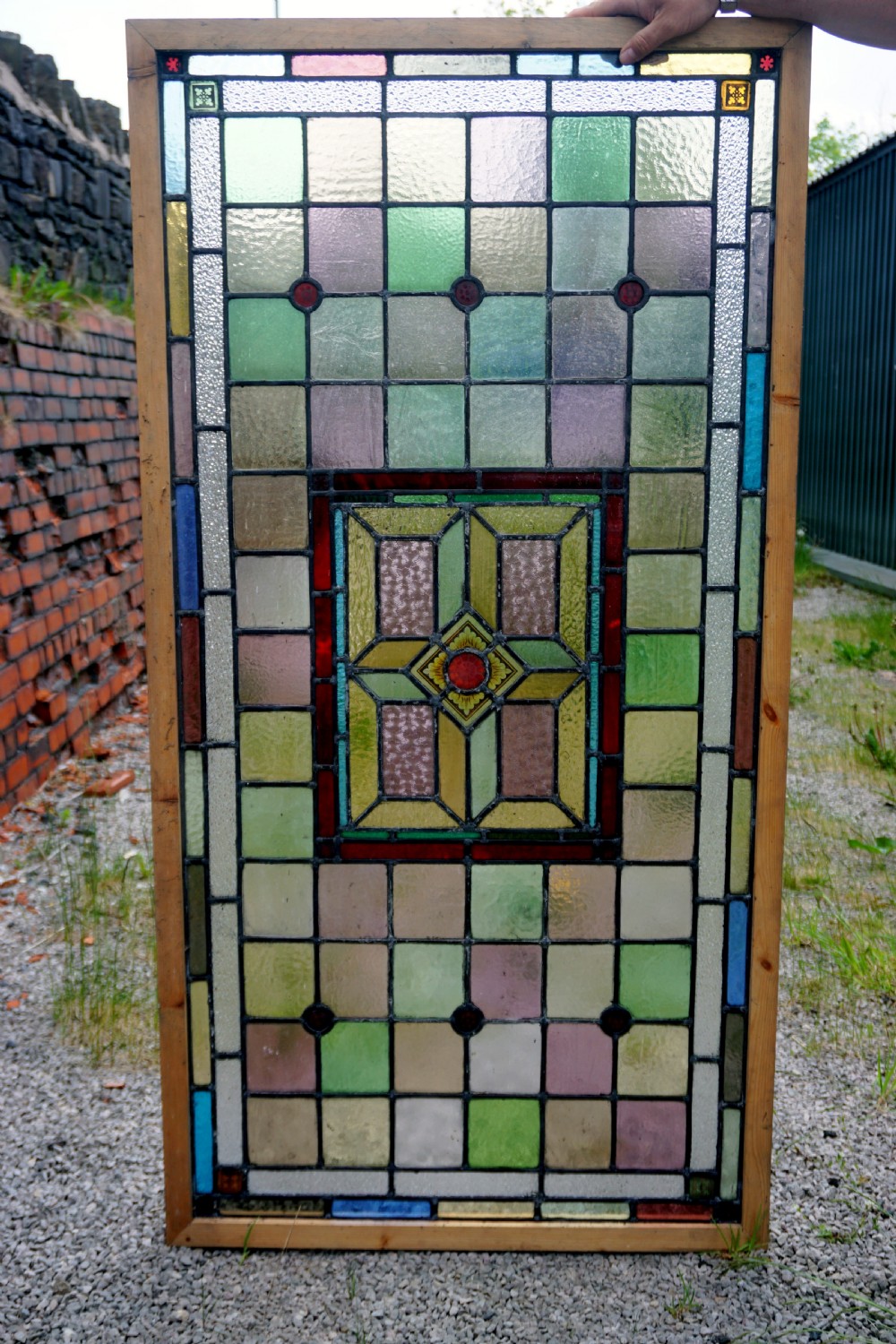a stunning large victorian stained glass window
