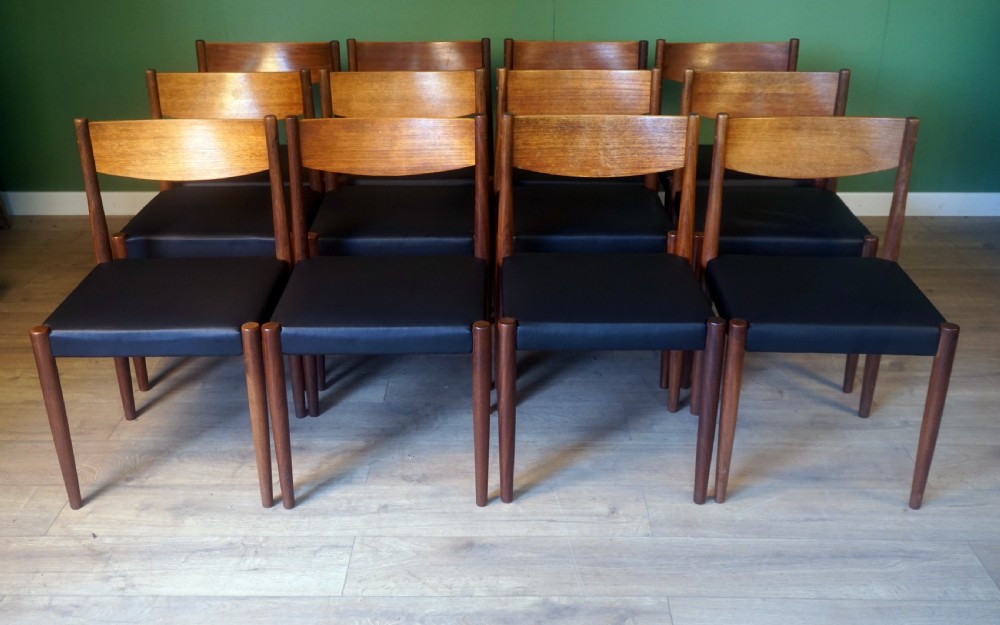 set of 12 danish frem rojle teak chairs