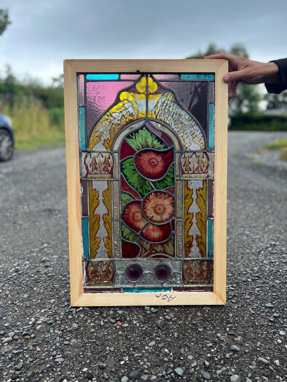 stained glass window painted with fruit