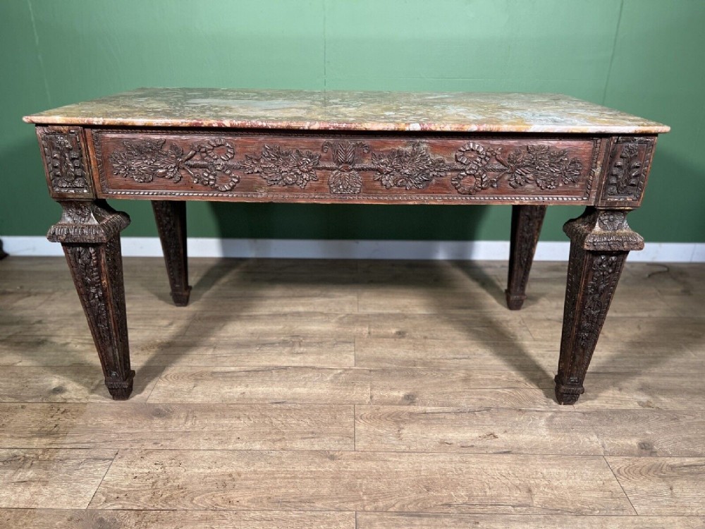 an italian carved fruitwood centre table
