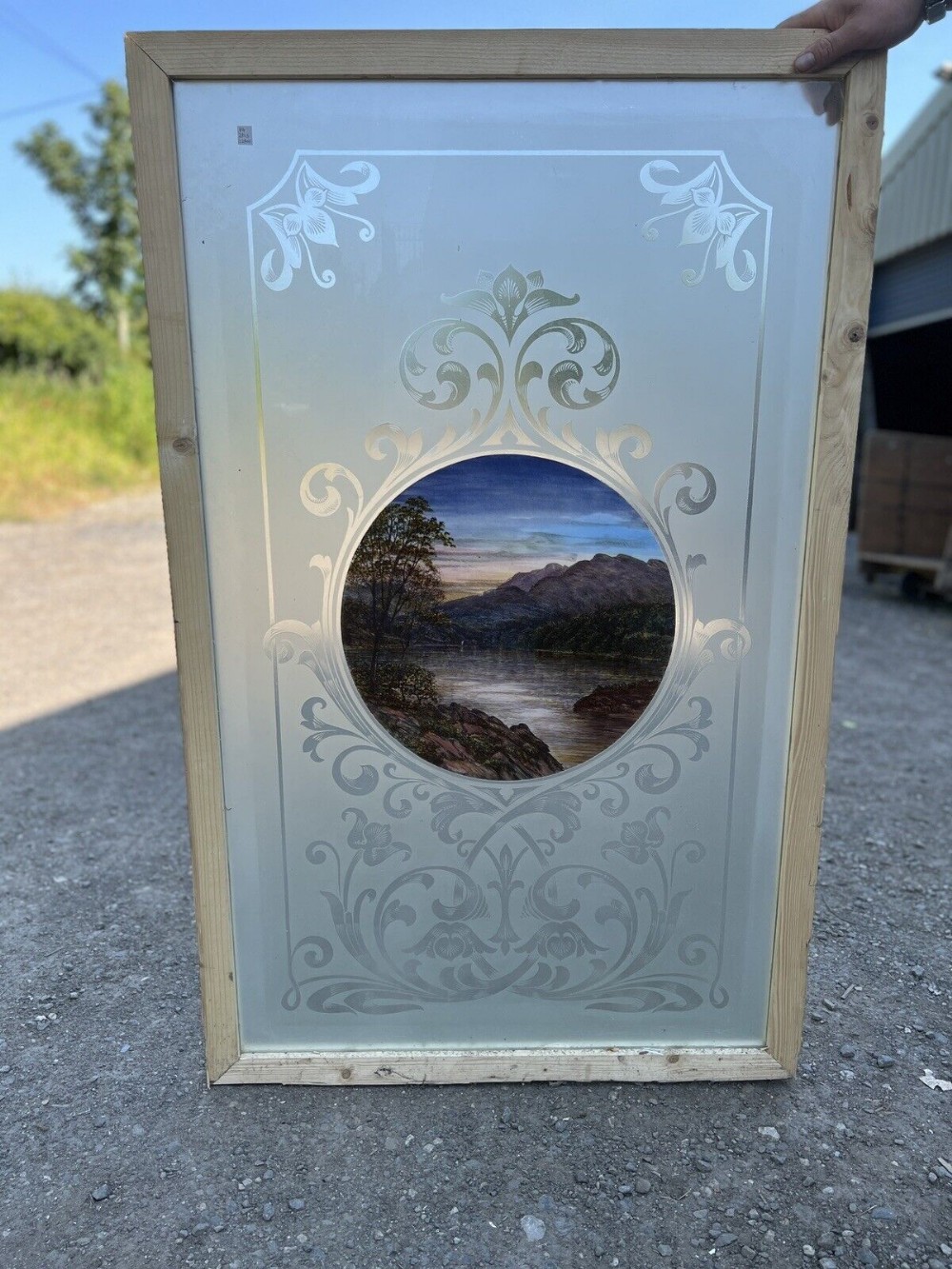 stunning painted and etched glass window