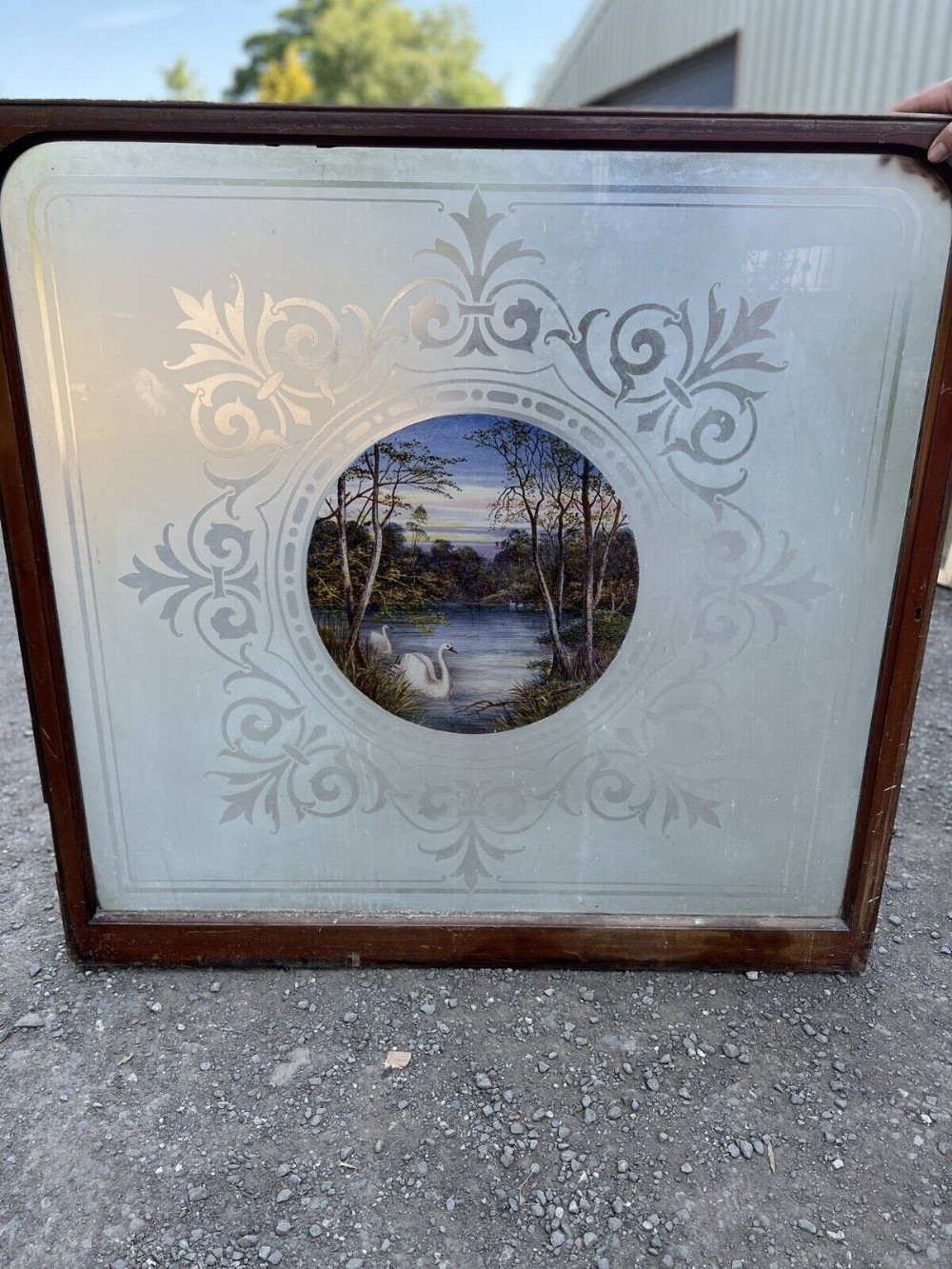 a fantastic etched and painted glass window