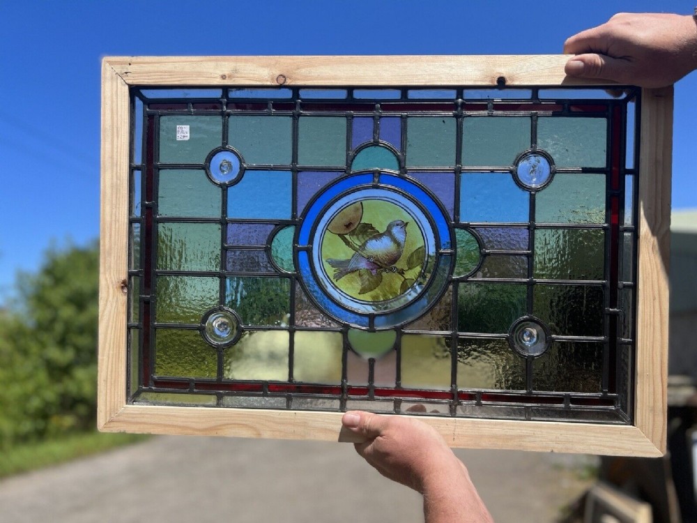 painted and leaded glass bird window