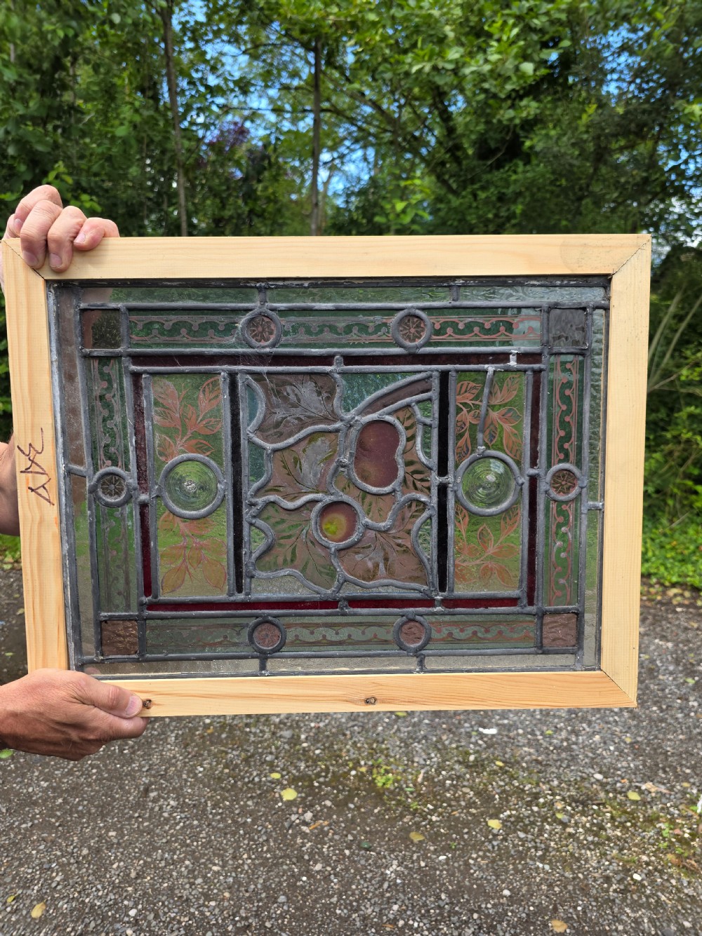 1890 antique leaded glass window with clear bullseyes and hand painted fruit design