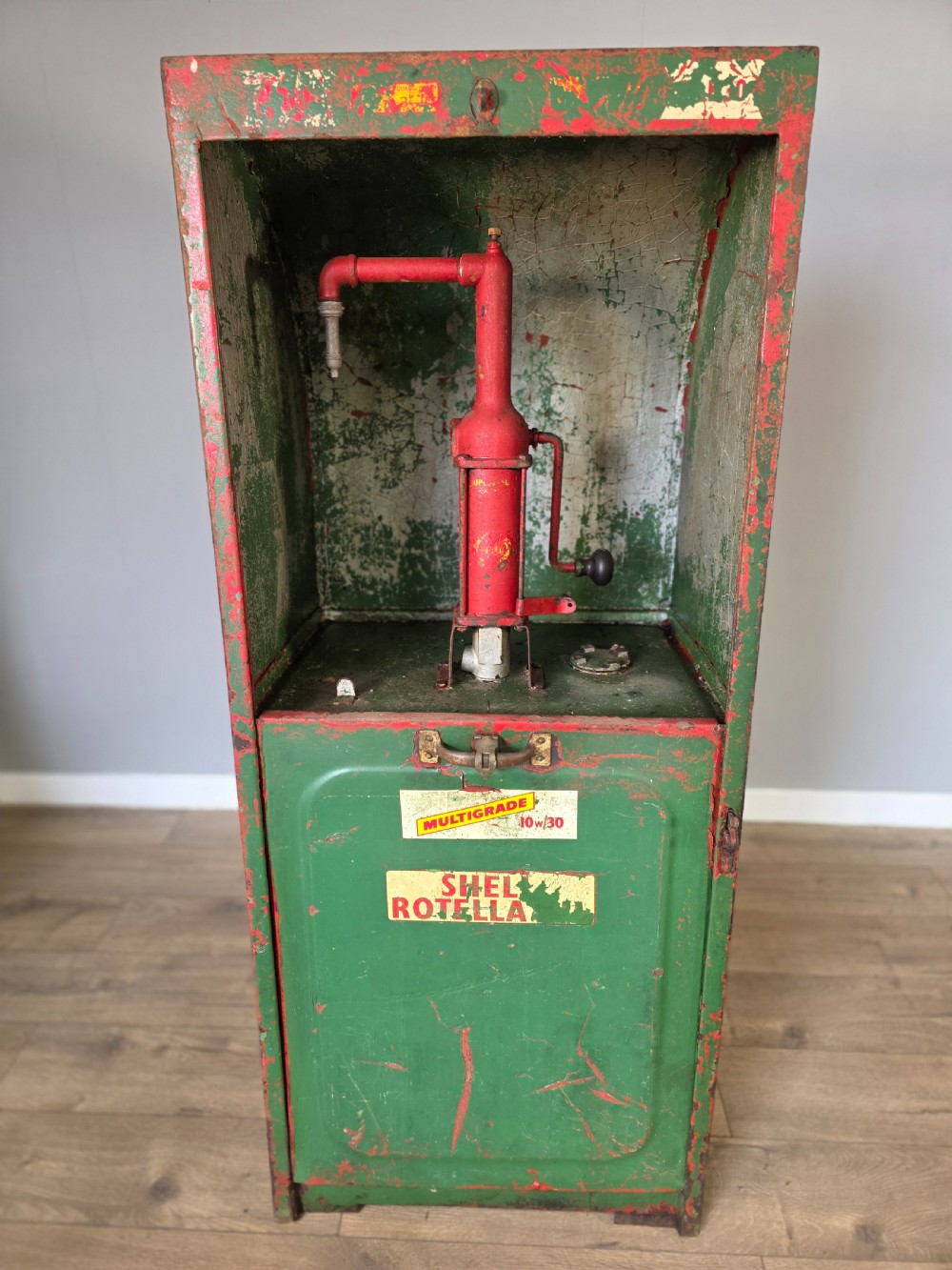 1950s shell oil pumpdispenser cabinet