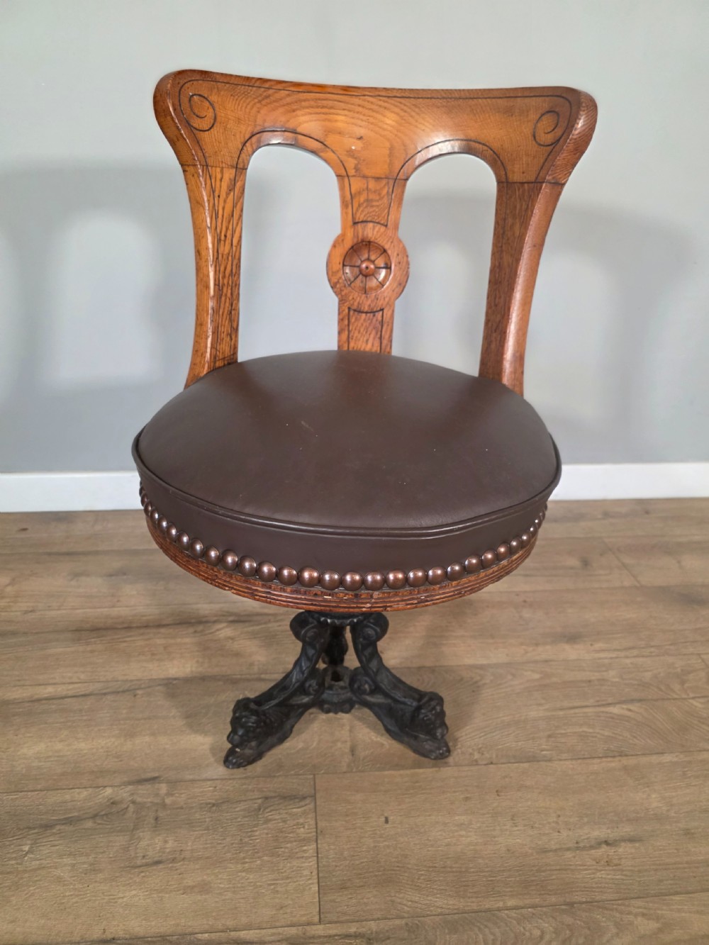 antique 1890s cast iron oak upholstered ships chair